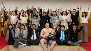 Ukrainian sumo wrestler shocked to win first title