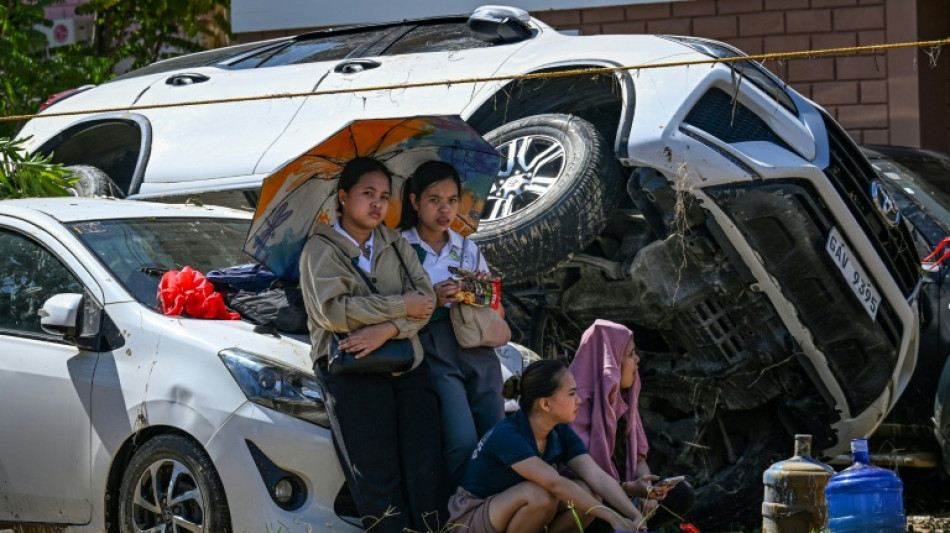 Philippines halts search for typhoon dead as huge new storm nears
