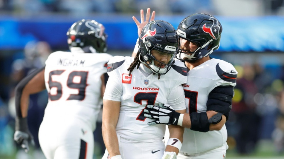 Texans reach NFL playoffs and Ravens win to stay in hunt
