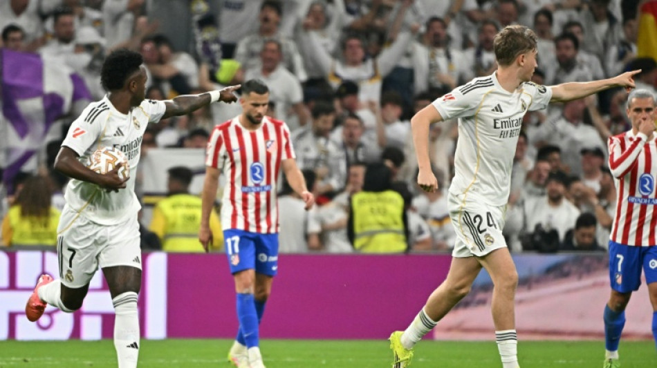 Real Madrid down Atletico in derby, leaders Barca edge Rayo
