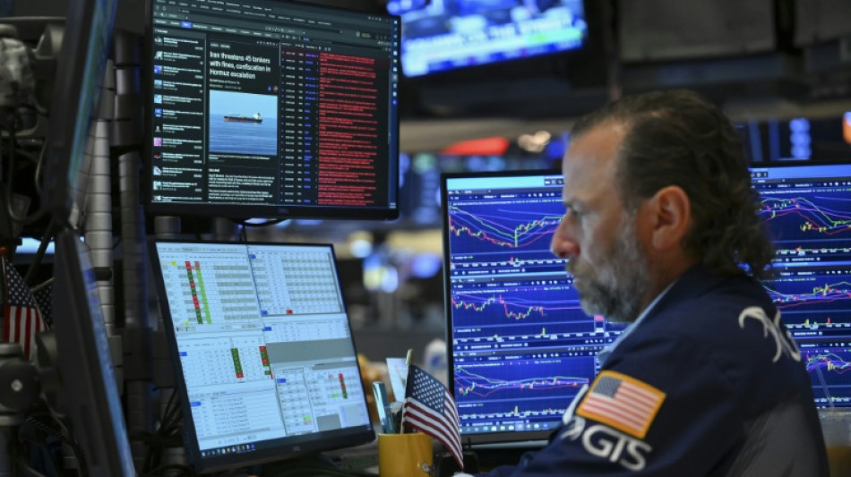 Wall Street en hausse, continue de guetter les &eacute;volutions au Moyen-Orient