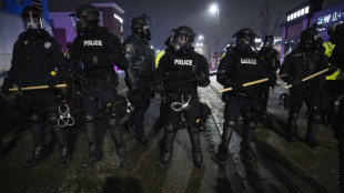 US border chief in Minneapolis as Trump tries to calm crisis