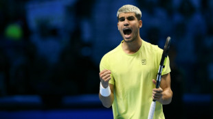 Alcaraz fights back to beat Fritz at ATP Finals