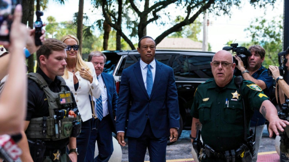 Tiger Woods pleads guilty to reckless driving, license suspended