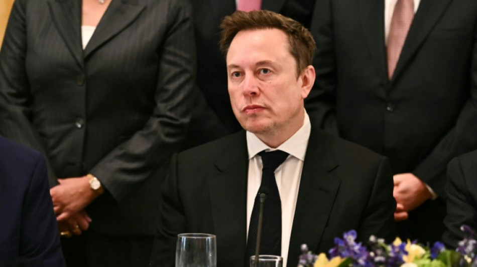 Musk backs SpaceX-Tesla merger as rocket firm turns profit