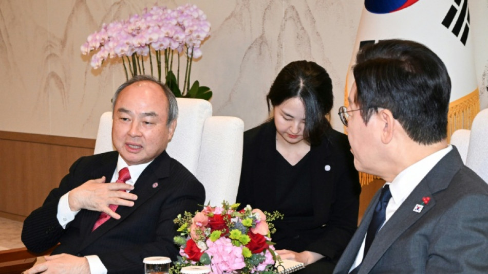 Softbank's Son says super AI could make humans like fish, win Nobel Prize