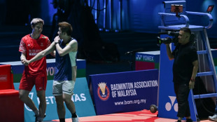 Kunlavut seals Malaysia Open title after injured Shi retires