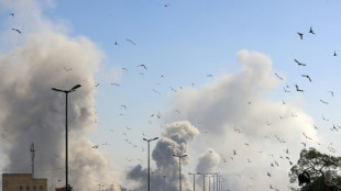 Oil prices climb as Mideast war rages, stocks fall on US jobs