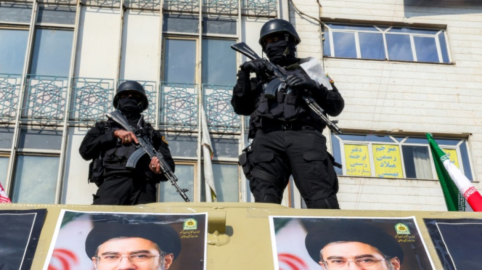 Armed teenagers on patrol strike fear into Tehran residents