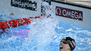 Imperious Ledecky beats McIntosh to win 800m free thriller